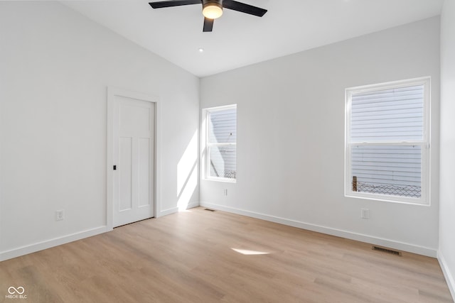 2362 English Ave, Indianapolis, IN 46201 - unfurnished bedroom featuring baseboards, visible vents, light wood-style flooring, and ceiling fan