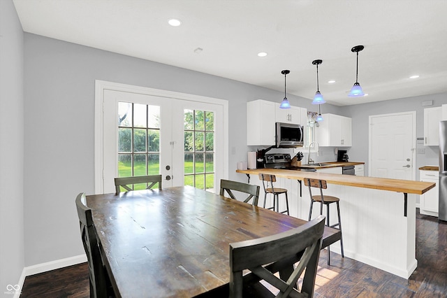8315 San Marcos Cir, Indianapolis, IN 46256 - dining room with recessed lighting, french doors, and dark wood-style flooring