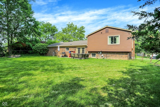 8315 San Marcos Cir, Indianapolis, IN 46256 - rear view of house featuring brick siding