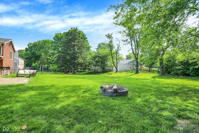 8315 San Marcos Cir, Indianapolis, IN 46256 - view of yard with a fire pit