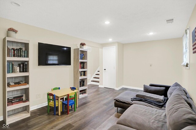 8315 San Marcos Cir, Indianapolis, IN 46256 - living room featuring dark wood-style flooring, stairway, and recessed lighting