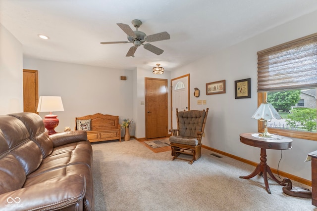 1864 Holiday Pines Dr, Brownsburg, IN 46112 - living area featuring light colored carpet, ceiling fan, and baseboards