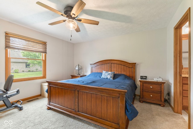 1864 Holiday Pines Dr, Brownsburg, IN 46112 - bedroom with light carpet, baseboards, and a ceiling fan