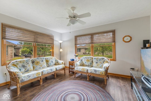 1864 Holiday Pines Dr, Brownsburg, IN 46112 - living room featuring baseboards, healthy amount of natural light, wood finished floors, and ceiling fan