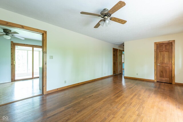 4132 Freeman Ridge Rd, Nashville, IN 47448 - spare room with ceiling fan, wood finished floors, and baseboards