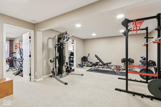 exercise area with carpet flooring, baseboards, and recessed lighting