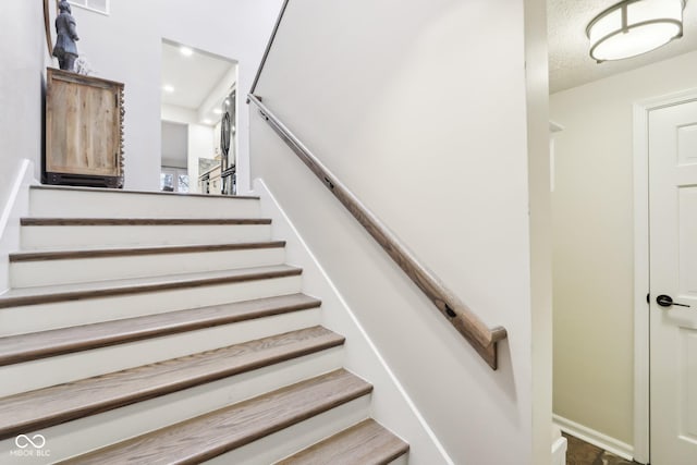 stairs featuring recessed lighting and visible vents