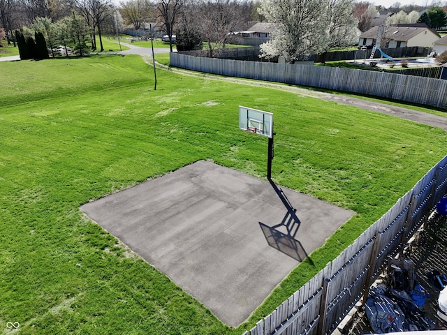 exterior space with a residential view and fence