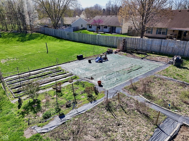 view of yard featuring a residential view and fence