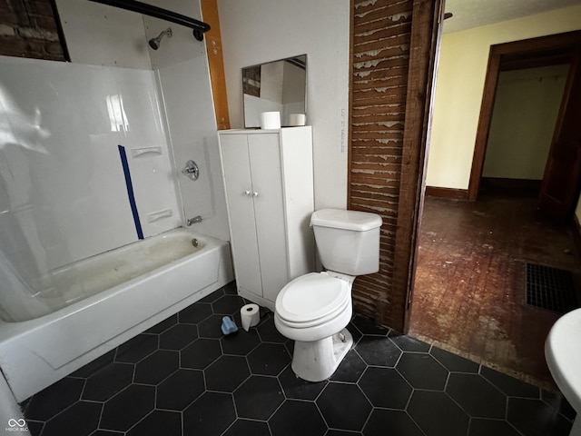 3179 W 400 N, Fairland, IN 46126 - bathroom featuring toilet, shower / bathtub combination, and tile patterned floors