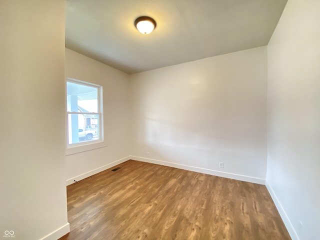 1518 Lawton Ave, Indianapolis, IN 46203 - empty room featuring wood finished floors