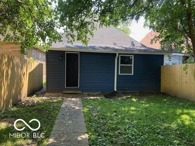 1518 Lawton Ave, Indianapolis, IN 46203 - back of house featuring a shingled roof