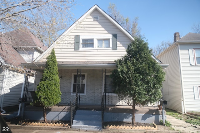 657 Birch Ave, Indianapolis, IN 46221 - view of front facade featuring covered porch