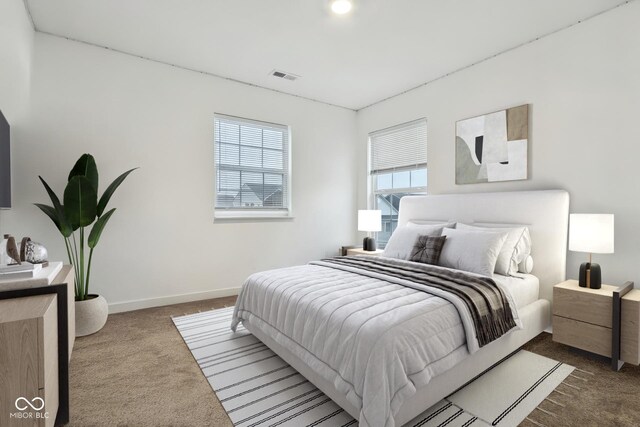 5150 Bramwell Ln, Whitestown, IN 46075 - carpeted bedroom featuring multiple windows and baseboards