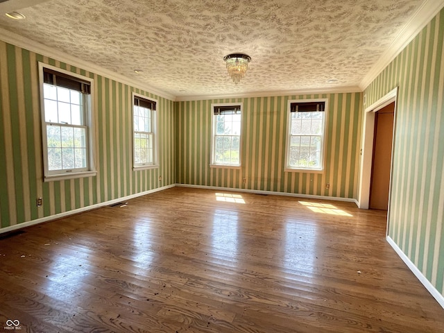 7180 N State Road 42, Eminence, IN 46125 - spare room featuring crown molding, wallpapered walls, and wood finished floors