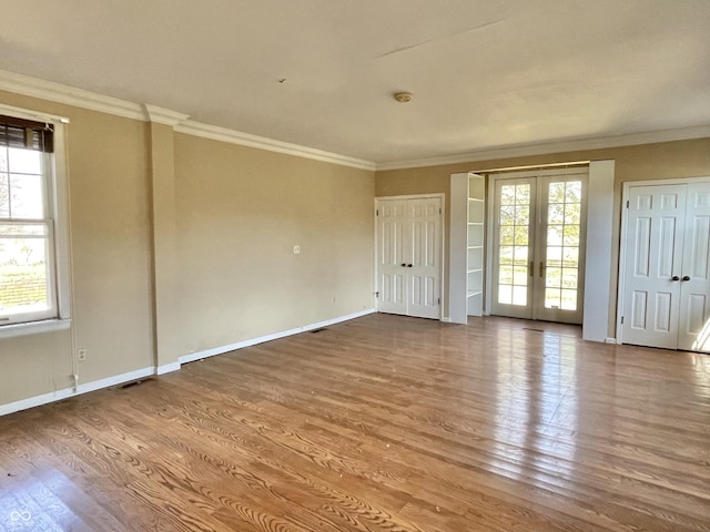 7180 N State Road 42, Eminence, IN 46125 - spare room with plenty of natural light, french doors, crown molding, and wood finished floors