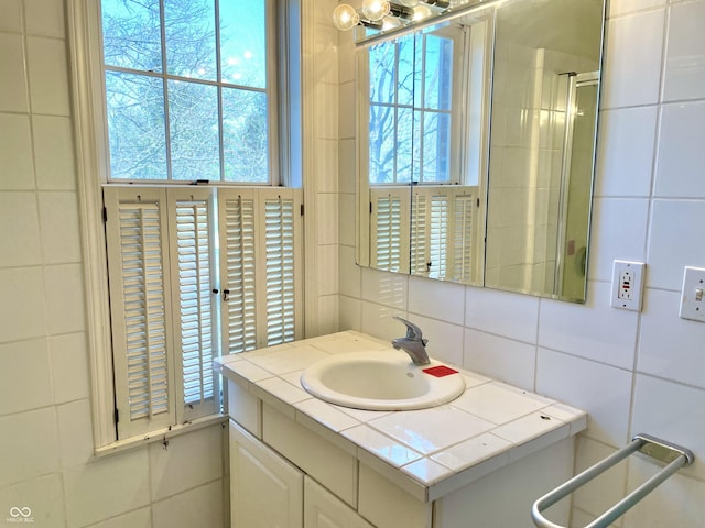 7180 N State Road 42, Eminence, IN 46125 - bathroom with tile walls, vanity, and a shower with shower door