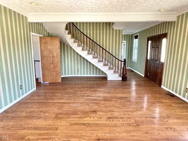 7180 N State Road 42, Eminence, IN 46125 - foyer featuring stairs, baseboards, wallpapered walls, and wood finished floors