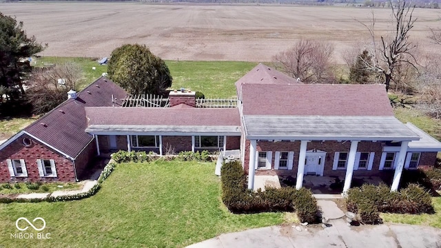 7180 N State Road 42, Eminence, IN 46125 - exterior space with a front yard, brick siding, and a rural view