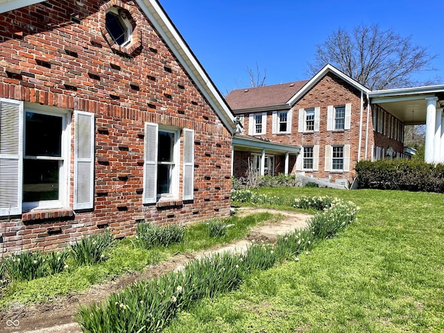 7180 N State Road 42, Eminence, IN 46125 - view of front facade with a front lawn and brick siding