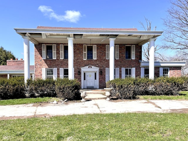 7180 N State Road 42, Eminence, IN 46125 - greek revival house featuring brick siding