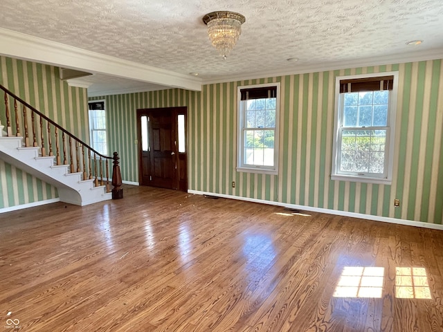 7180 N State Road 42, Eminence, IN 46125 - interior space featuring baseboards, a textured ceiling, wood finished floors, and wallpapered walls