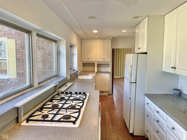 7180 N State Road 42, Eminence, IN 46125 - kitchen with a sink, white appliances, recessed lighting, white cabinetry, and wood finished floors