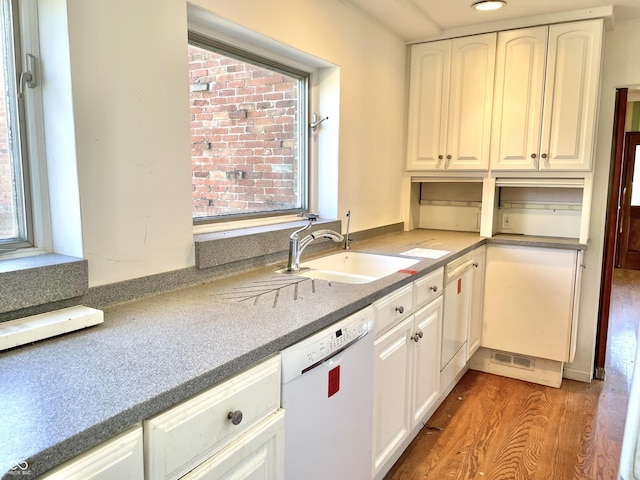 7180 N State Road 42, Eminence, IN 46125 - kitchen with a sink, white cabinets, light wood-type flooring, and dishwasher