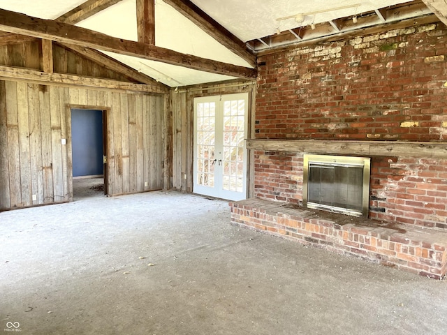 7180 N State Road 42, Eminence, IN 46125 - unfurnished living room with french doors, vaulted ceiling with beams, and a fireplace