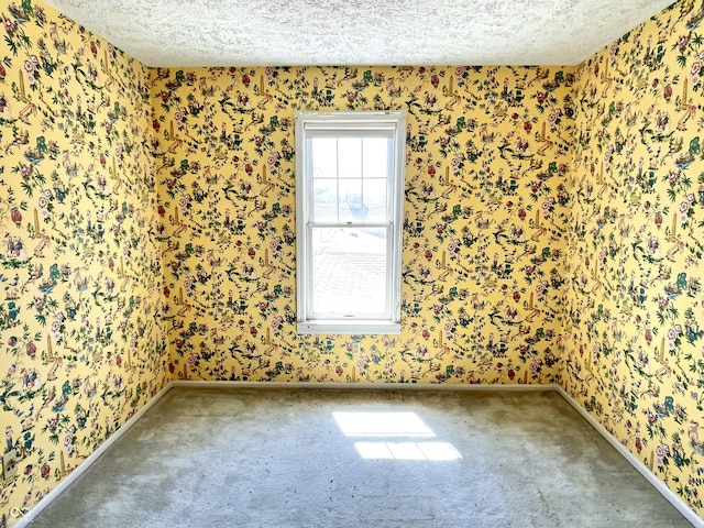 7180 N State Road 42, Eminence, IN 46125 - carpeted empty room featuring a textured ceiling, wallpapered walls, and baseboards
