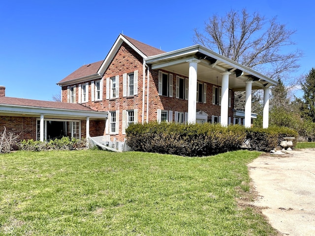 7180 N State Road 42, Eminence, IN 46125 - view of front of home with brick siding and a front lawn