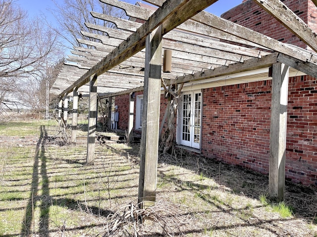 7180 N State Road 42, Eminence, IN 46125 - view of side of property featuring a pergola, brick siding, and french doors
