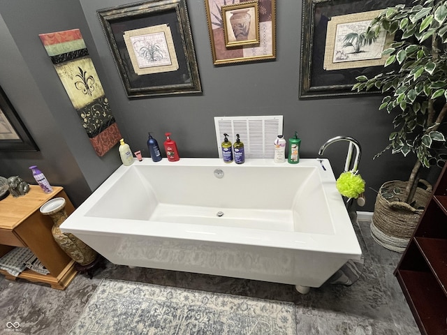 bathroom featuring a tub
