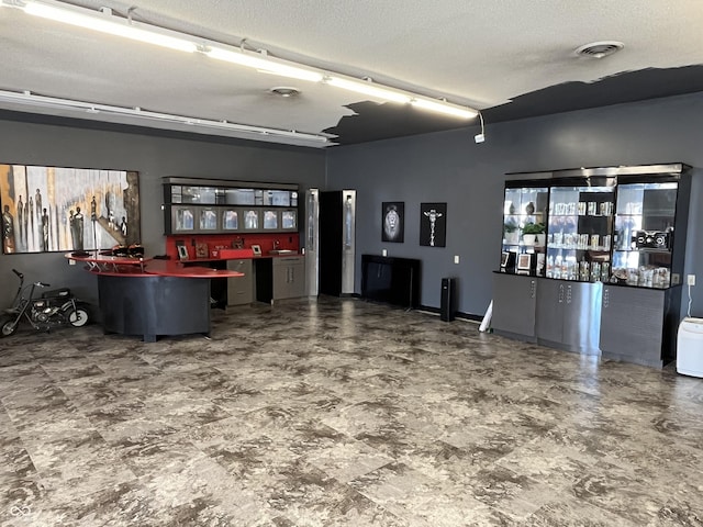 reception with a community bar and visible vents