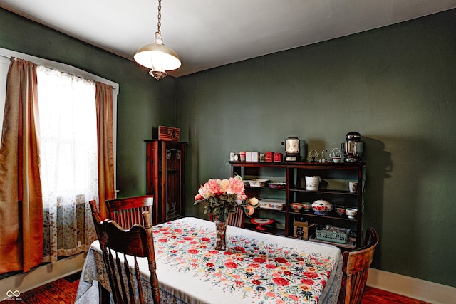 110 E Hendricks St, Shelbyville, IN 46176 - dining room featuring baseboards and wood finished floors