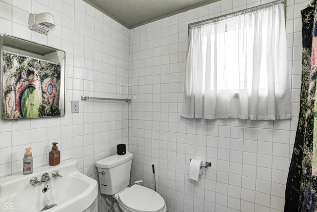 110 E Hendricks St, Shelbyville, IN 46176 - bathroom with tile walls and toilet