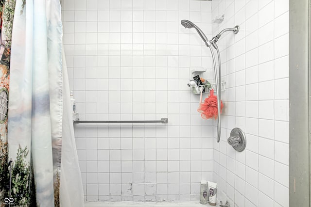110 E Hendricks St, Shelbyville, IN 46176 - bathroom with shower / tub combo with curtain