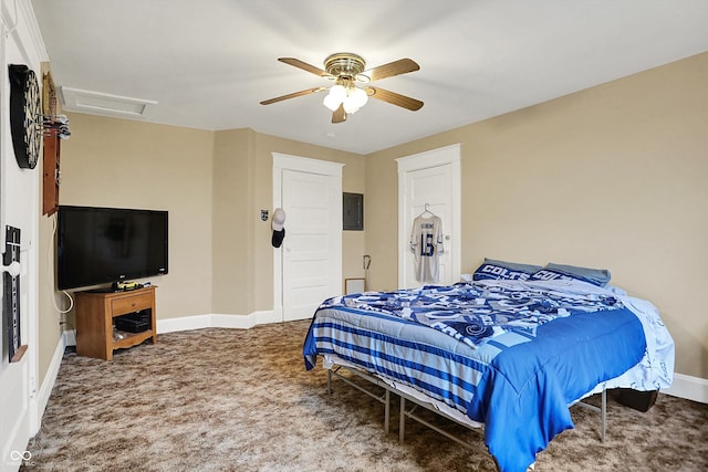 bedroom with baseboards, carpet floors, ceiling fan, and attic access
