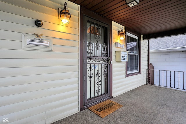 entrance to property with covered porch