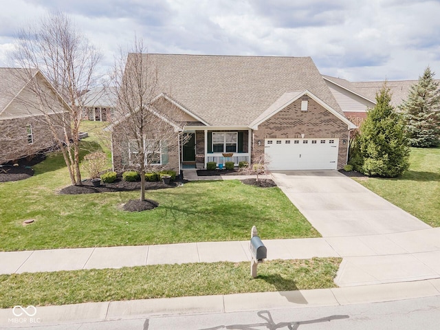 view of front of house with concrete driveway, an attached garage, a front lawn, brick siding, and a porch