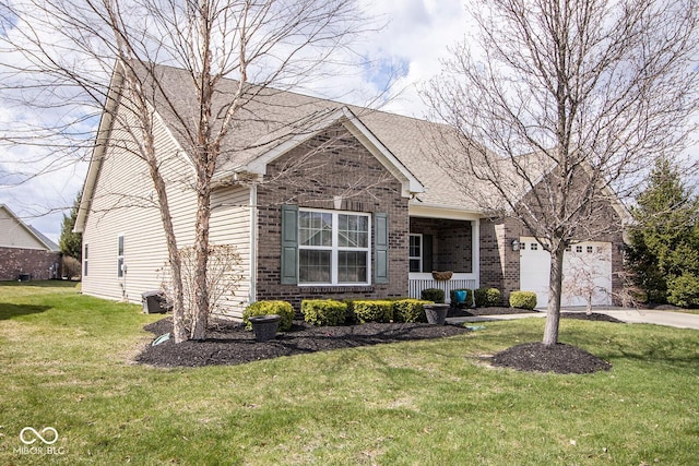 view of front of house with a front lawn, a garage, brick siding, and concrete driveway