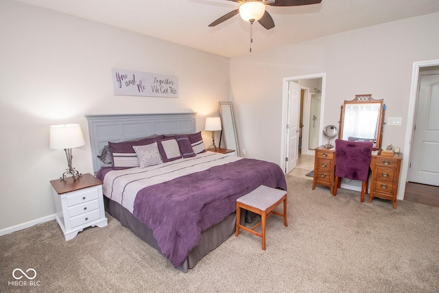 bedroom featuring baseboards, light colored carpet, and ceiling fan