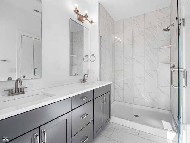 2578 Filson St, Carmel, IN 46032 - bathroom featuring a sink, a shower stall, double vanity, and marble finish floor