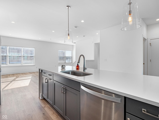 2578 Filson St, Carmel, IN 46032 - kitchen featuring a sink, hanging light fixtures, stainless steel dishwasher, and open floor plan