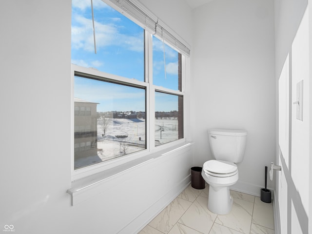 2578 Filson St, Carmel, IN 46032 - bathroom featuring toilet, baseboards, and marble finish floor