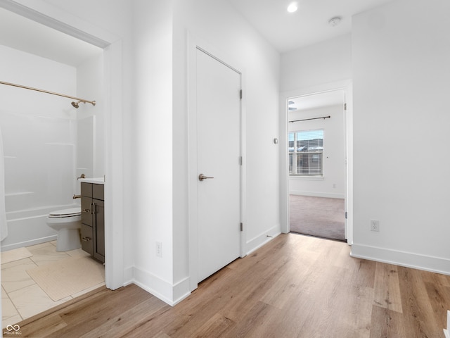 2578 Filson St, Carmel, IN 46032 - corridor with light wood-style floors and baseboards