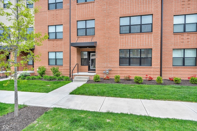 2578 Filson St, Carmel, IN 46032 - view of front facade with brick siding and a front lawn