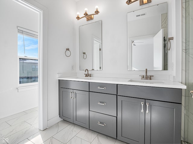 2578 Filson St, Carmel, IN 46032 - full bathroom featuring visible vents, a sink, marble finish floor, and double vanity