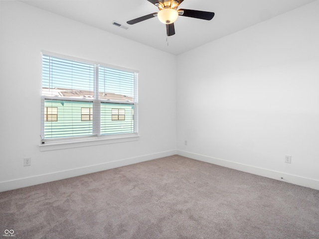 2578 Filson St, Carmel, IN 46032 - empty room with baseboards, a ceiling fan, carpet floors, and visible vents