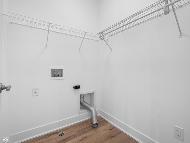 2578 Filson St, Carmel, IN 46032 - laundry room with washer hookup, hookup for an electric dryer, laundry area, wood finished floors, and baseboards